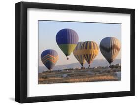 Turkey, Anatolia, Cappadocia, Goreme. Hot air balloons flying above the valley.-Emily Wilson-Framed Photographic Print