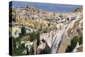 Turkey, Anatolia, Goreme National Park, Uchisar village and Pidgeon Valley rock.-Emily Wilson-Stretched Canvas