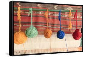 Turkey, Izmir, Selcuk, weaving loom with balls of wool or yarn.-Emily Wilson-Framed Stretched Canvas