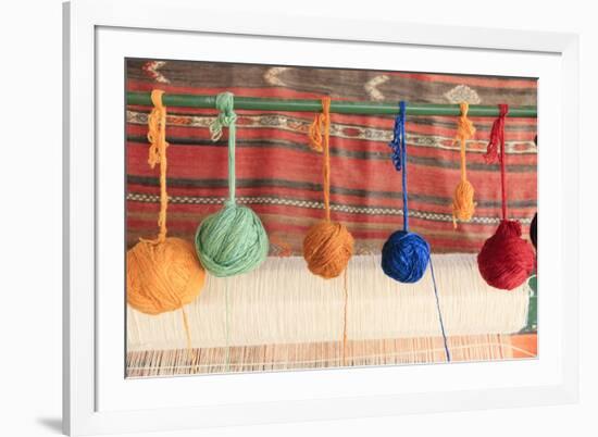 Turkey, Izmir, Selcuk, weaving loom with balls of wool or yarn.-Emily Wilson-Framed Premium Photographic Print