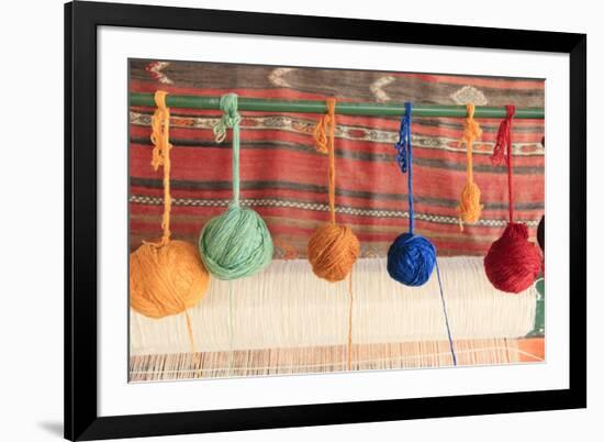Turkey, Izmir, Selcuk, weaving loom with balls of wool or yarn.-Emily Wilson-Framed Premium Photographic Print
