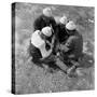 Turkish boys from Bulgaria pass the time playing games.Edirne, Turkey,1951.-Erich Lessing-Stretched Canvas