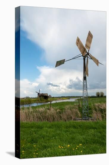 Turning Old Metal Windmill-Ruud Morijn-Stretched Canvas