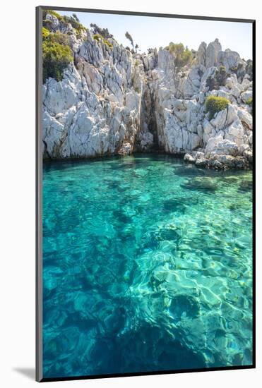 Turquoise colored crystal clear water at a rocky island, Aegean Sea, Turkey-Ali Kabas-Mounted Photographic Print