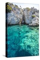 Turquoise colored crystal clear water at a rocky island, Aegean Sea, Turkey-Ali Kabas-Stretched Canvas