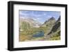 Turquoise lake between rocky peaks and meadows, Crap Alv Lejets, Albula Pass, Canton of Graubunden,-Roberto Moiola-Framed Photographic Print