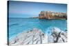 Turquoise sea at dusk framed by the old town perched on the rocks, Polignano a Mare, Province of Ba-Roberto Moiola-Stretched Canvas