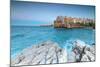 Turquoise sea at dusk framed by the old town perched on the rocks, Polignano a Mare, Province of Ba-Roberto Moiola-Mounted Photographic Print