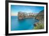 Turquoise sea at sunset framed by the old town perched on the rocks, Polignano a Mare, Province of -Roberto Moiola-Framed Photographic Print