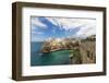 Turquoise sea framed by the old town perched on the rocks, Polignano a Mare, Province of Bari, Apul-Roberto Moiola-Framed Photographic Print