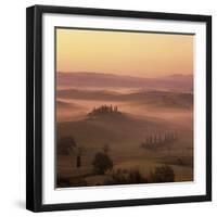 Tuscan farmhouse with cypress trees in misty landscape at sunrise, San Quirico d'Orcia-Stuart Black-Framed Photographic Print