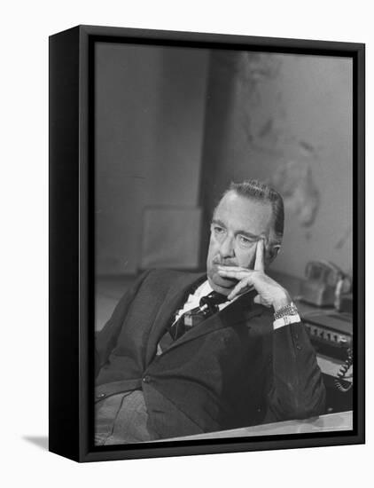 TV Newscaster Walter Cronkite, Preparing for His TV Show-Leonard Mccombe-Framed Stretched Canvas
