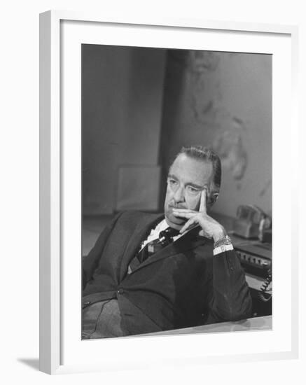 TV Newscaster Walter Cronkite, Preparing for His TV Show-Leonard Mccombe-Framed Premium Photographic Print