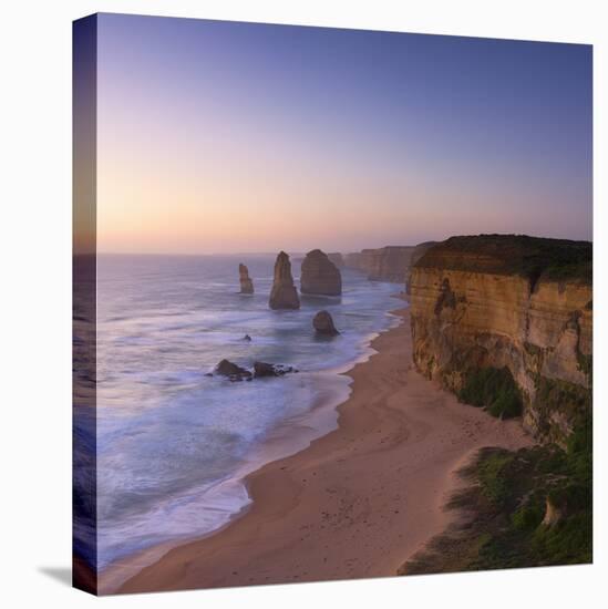 Twelve Apostles at Sunset, Port Campbell National Park, Great Ocean Road, Victoria, Australia-Ian Trower-Stretched Canvas