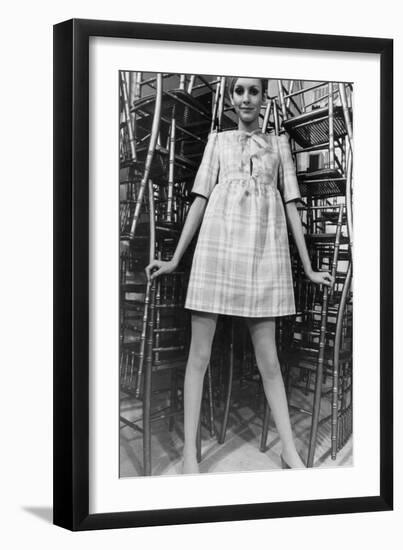 Twiggy Wearing Dolly Dress with Pink Ribbons (By Paul Babb and Pamela Proctor) February 17, 1967-null-Framed Photo