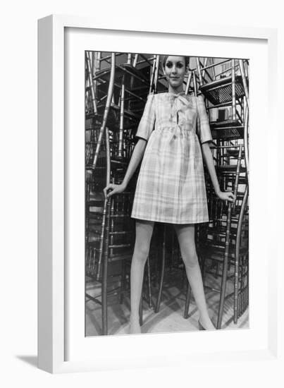 Twiggy Wearing Dolly Dress with Pink Ribbons (By Paul Babb and Pamela Proctor) February 17, 1967-null-Framed Photo