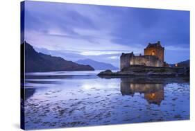 Twilight over Eilean Donan Castle on Loch Duich, Dornie, Scotland. Winter (November)-Adam Burton-Stretched Canvas