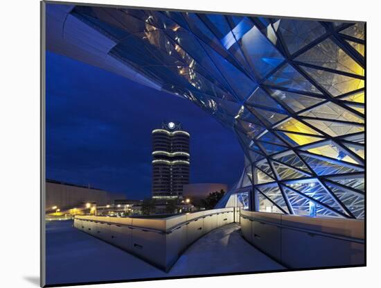 Twilight View of Pedestrian Bridge to BMW Headquarters Office Building and Museum, BMW-Cahir Davitt-Mounted Photographic Print