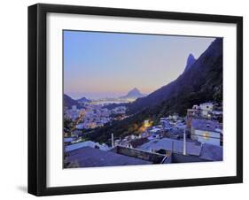 Twilight view of the Favela Santa Marta with Corcovado and the Christ statue behind, Rio de Janeiro-Karol Kozlowski-Framed Photographic Print