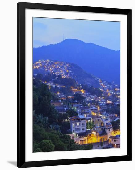 Twilight view of the favelas Unidos de Santa Teresa Morro do Escondidinho and Morro dos Prazeres, R-Karol Kozlowski-Framed Photographic Print