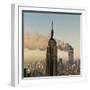 Twin Towers of the World Trade Center Burn Behind the Empire State Buildiing, September 11, 2001-null-Framed Premium Photographic Print