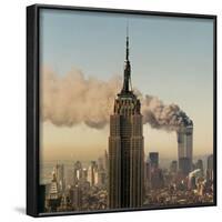 Twin Towers of the World Trade Center Burn Behind the Empire State Buildiing, September 11, 2001-null-Framed Photographic Print