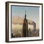 Twin Towers of the World Trade Center Burn Behind the Empire State Buildiing, September 11, 2001-null-Framed Photographic Print