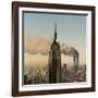 Twin Towers of the World Trade Center Burn Behind the Empire State Buildiing, September 11, 2001-null-Framed Photographic Print