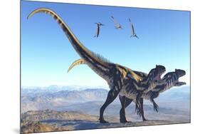 Two Allosaurus Dinosaurs Look for Prey on a High Mountain-null-Mounted Art Print