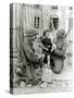 Two American Soldiers from the U.S. Corps of Engineers with a Little Girl and a Puppy-null-Stretched Canvas