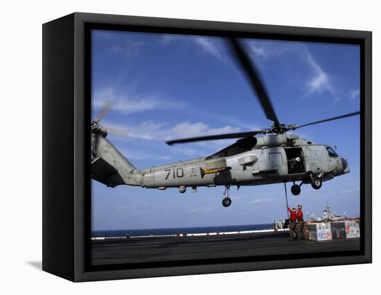 Two Aviation Ordnancemen Connect Transport Cables to a SH-60B Helicopter-Stocktrek Images-Framed Stretched Canvas