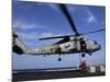 Two Aviation Ordnancemen Connect Transport Cables to a SH-60B Helicopter-Stocktrek Images-Mounted Photographic Print