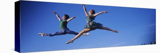 Two Ballet Dancers in Mid-air, Washington State, USA-null-Stretched Canvas