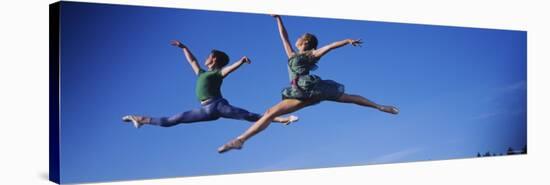 Two Ballet Dancers in Mid-air, Washington State, USA-null-Stretched Canvas
