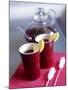 Two Beakers of Fruit Tea with Lemon Wedges, Sugar Sticks-Anita Oberhauser-Mounted Photographic Print