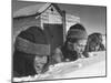 Two Boys and a Girl Up to Their Necks in a Snowdrift,Nibbling at the Snow-George Silk-Mounted Photographic Print