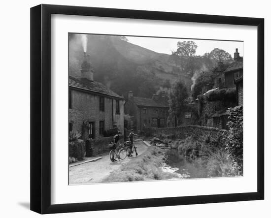 Two boys out on their bicycles near a stream in the Peak District-Staff-Framed Photographic Print