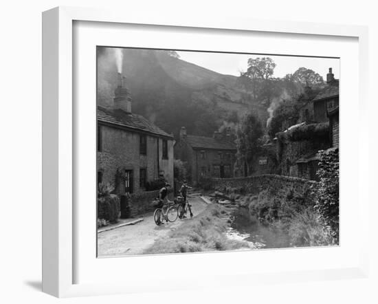 Two boys out on their bicycles near a stream in the Peak District-Staff-Framed Photographic Print