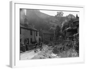 Two boys out on their bicycles near a stream in the Peak District-Staff-Framed Photographic Print