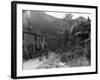 Two boys out on their bicycles near a stream in the Peak District-Staff-Framed Photographic Print