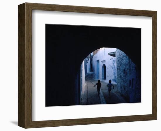 Two Boys Running Through Kasbah, Chefchaouen, Morocco-Jeffrey Becom-Framed Photographic Print