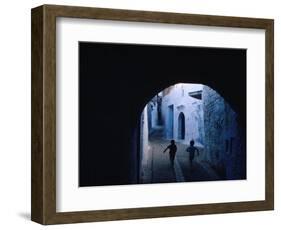 Two Boys Running Through Kasbah, Chefchaouen, Morocco-Jeffrey Becom-Framed Photographic Print
