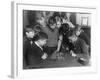 Two Boys Sit for a Game of Chess. Eight Spectators Look On-null-Framed Photographic Print