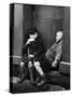 Two Boys Sitting on Doorstep-Nat Farbman-Stretched Canvas