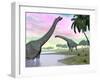 Two Brachiosaurus Dinosaurs in Landscape with Water and Palm Trees-null-Framed Art Print