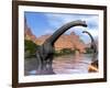 Two Brachiosaurus Dinosaurs in Water Next to Red Rock Mountains-null-Framed Art Print