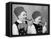 Two Brothers in Bavarian Costumes Pretend to Smoke Pipes, Ca. 1947-null-Framed Stretched Canvas