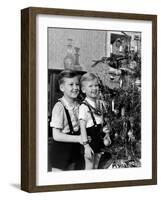 Two Brothers Look at a Christmas Tree in their Living Room in Germany, Ca. 1949-null-Framed Photographic Print