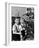 Two Brothers Look at a Christmas Tree in their Living Room in Germany, Ca. 1949-null-Framed Photographic Print