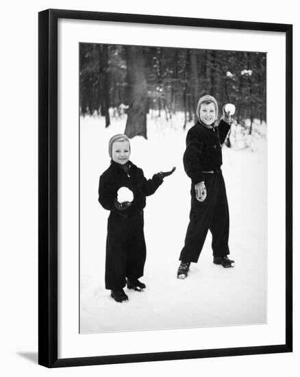 Two Brothers Play in the Snow, Ca. 1950-null-Framed Photographic Print